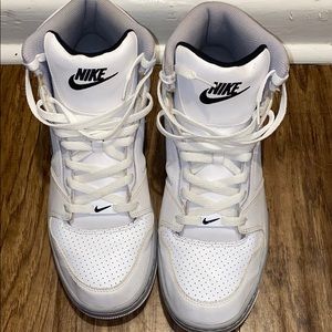 White and black men’s Nikes with Nike swoosh